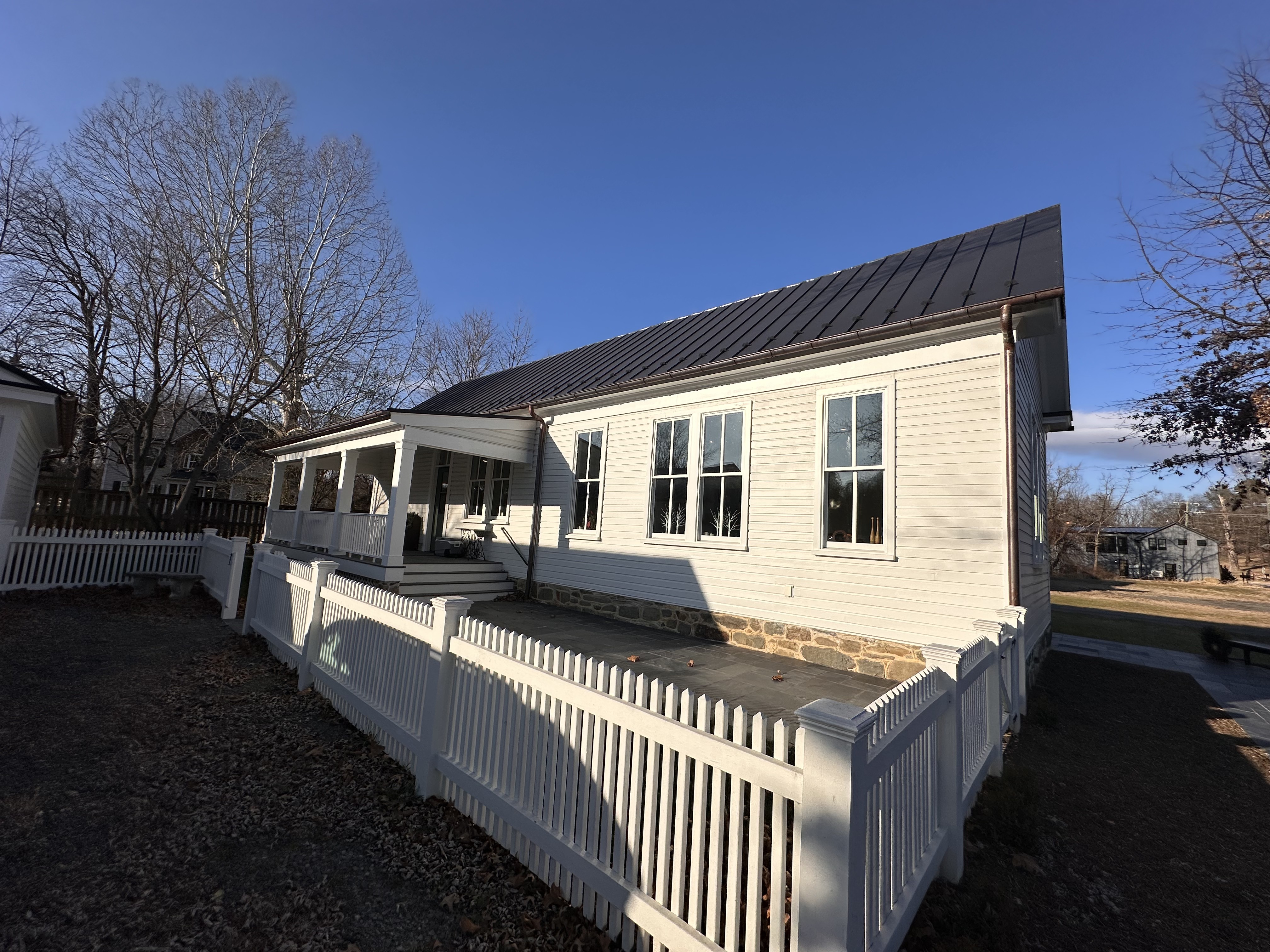 White picket fence at the schoolhouse